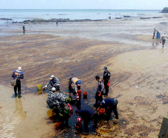 Indonesia to punish state firm over litany of failures behind Borneo oil spill